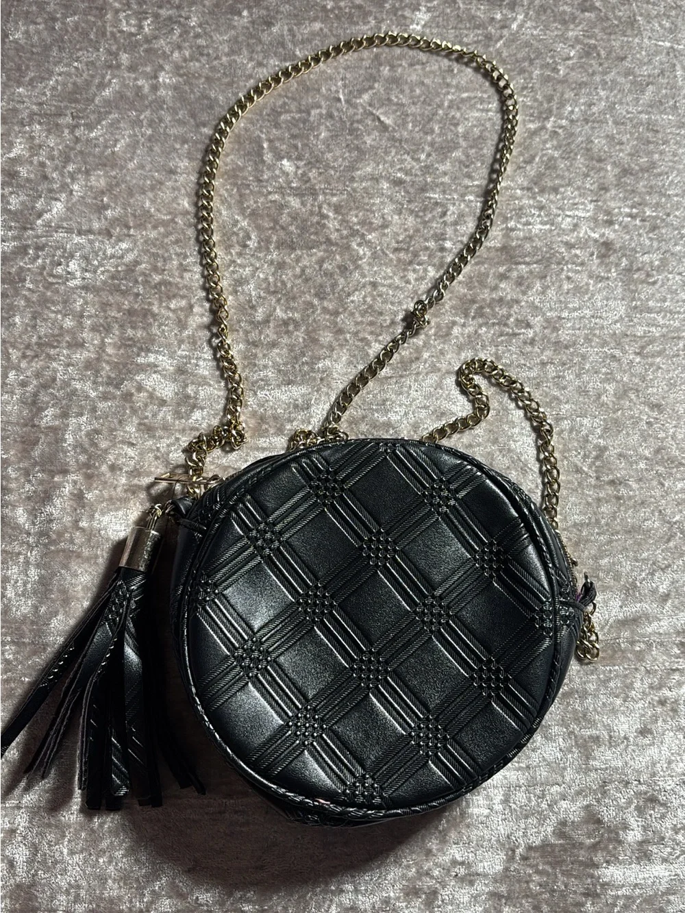 Black Quilted Round Crossbody Bag with Tassel